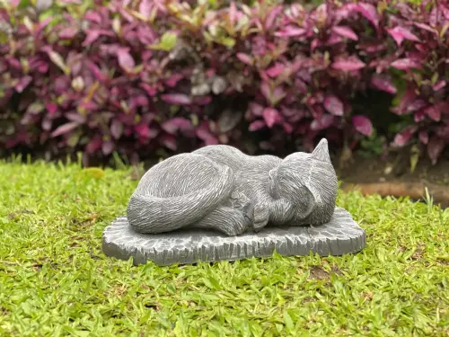 Product image of the product “Lilith -Lying cat on a base, 33 cm L | cast stone ”